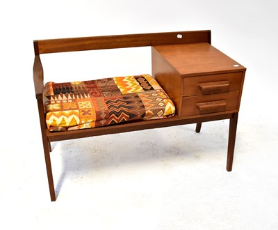 Lot 34 - A mid-20th century teak telephone table