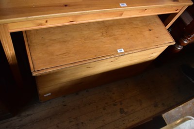 Lot 1092 - An old pine blanket chest with cast metal...