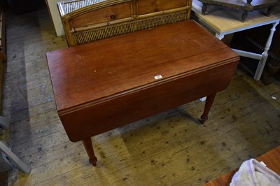 Lot 1105 - A 19th century stained pine drop-leaf Pembroke...