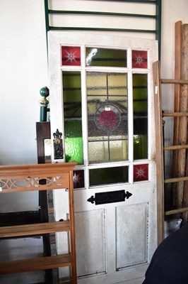 Lot 1136 - A vintage door with leaded glazed and stained...