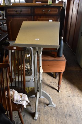 Lot 1145 - A painted lectern, height 126cm.