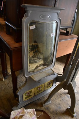 Lot 1146 - A cast metal splash back with mirrored glass...