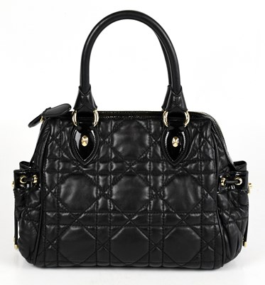 Lot 684 - CHRISTIAN DIOR; a black cannage quilted...