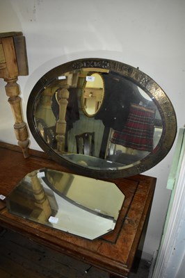 Lot 1152 - A circa 1900 sheet brass oval wall mirror with...