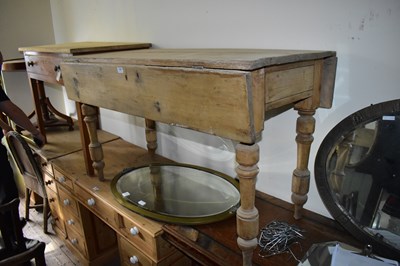 Lot 1155 - A pine side table with single drawer, on block...