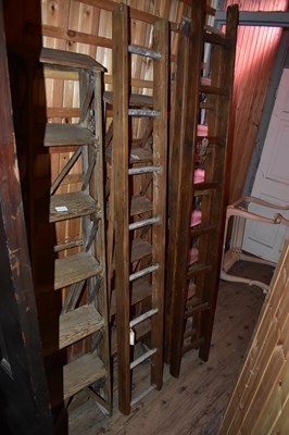 Lot 1172 - Nine sets of vintage step and folding ladders...