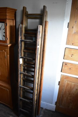 Lot 1178 - Five vintage pine sets of ladders (5).