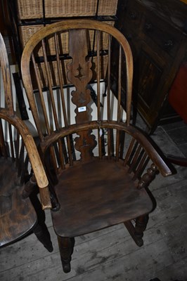 Lot 1186 - An 18th century and later elm seated Windsor...