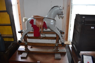 Lot 1188 - A vintage painted rocking horse, height 84cm.