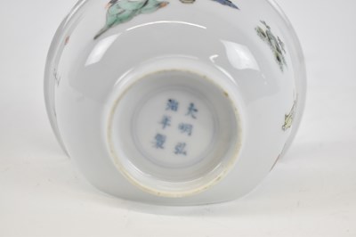 Lot 1043 - A Chinese Kangxi porcelain bowl with painted...