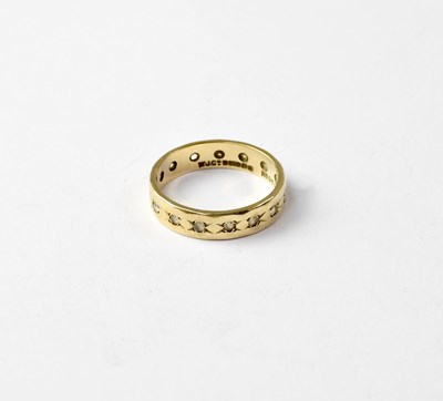 Lot 1028 - A 9ct gold band ring