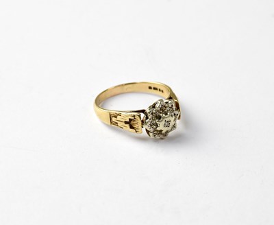 Lot 1056 - A vintage 9ct gold illusion set cluster ring