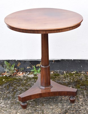 Lot 63 - A 19th century mahogany circular tilt-top...