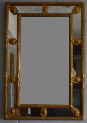 Lot 108 - A gilt framed rectangular sectional wall...