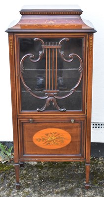 Lot 27 - An Edwardian inlaid mahogany music cabinet,...