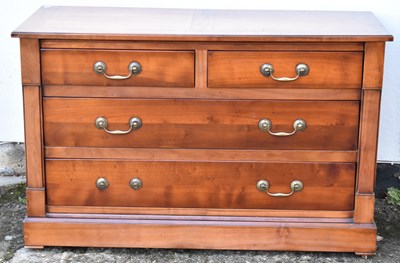 Lot 65 - A modern cherry wood chest of two short and...