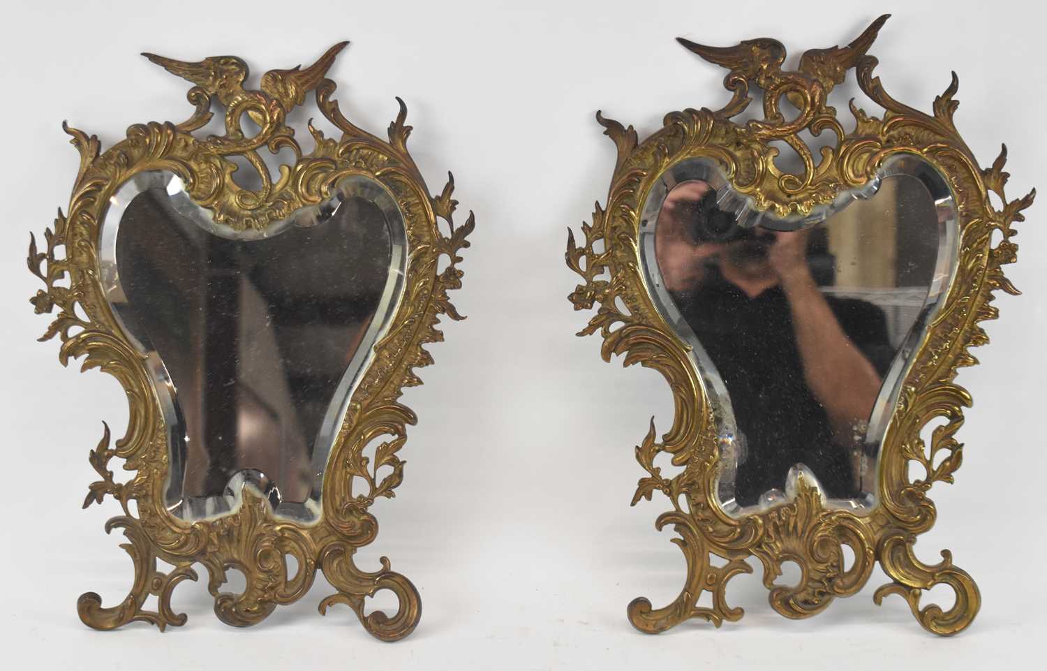 Lot 88 - A pair of small decorative brass framed...