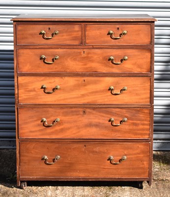 Lot 90 - A Georgian mahogany chest of two short and...