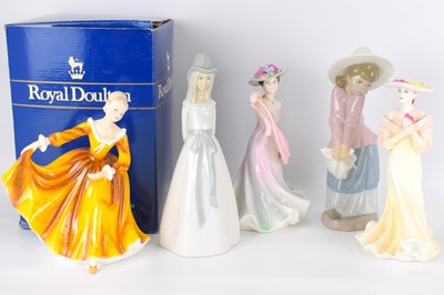 Lot 398 - Five porcelain figures of ladies, to include...