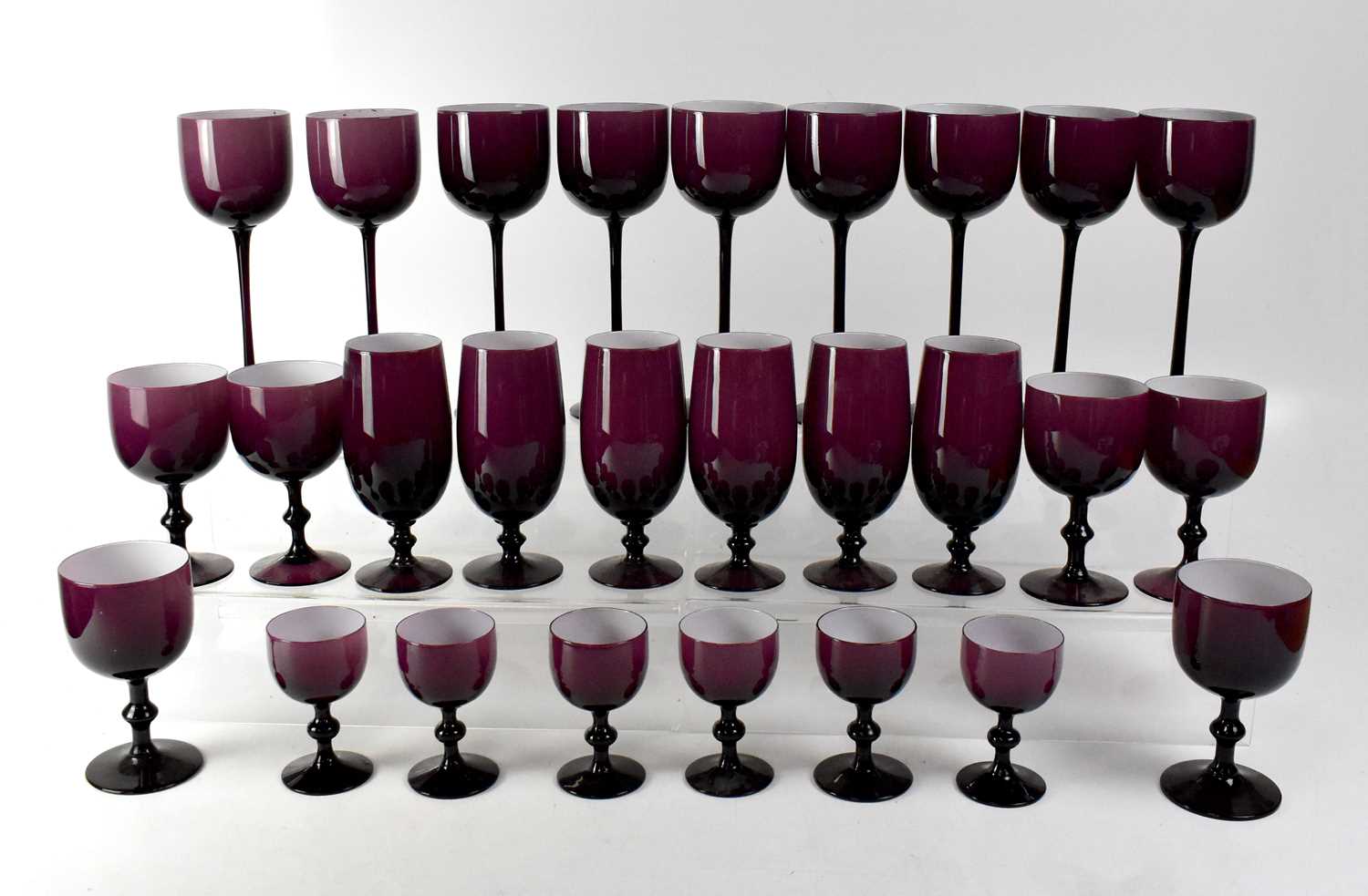 Lot 185 - A quantity of amethyst-coloured drinking glasses