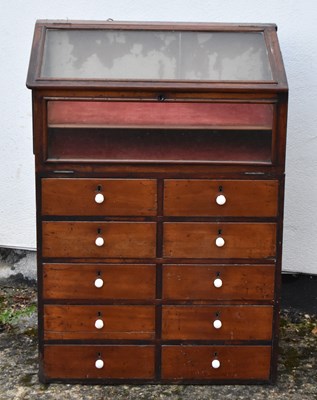 Lot 8 - A Victorian mahogany shop display cabinet, the...