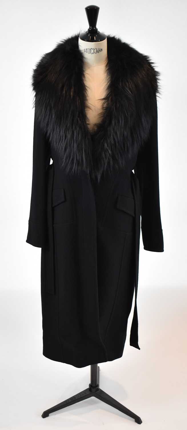 Lot 16 - ELIE SAAB; a black wool mix full length coat...
