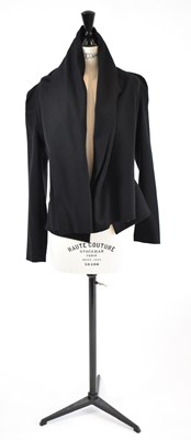Lot 19 - ROLAND MOURET; a black wool mix short fitted...
