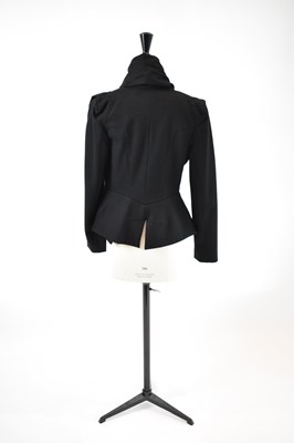 Lot 19 - ROLAND MOURET; a black wool mix short fitted...