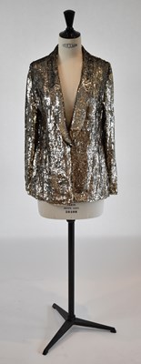 Lot 26 - GRYPHON; a gold sequined fitted evening jacket,...