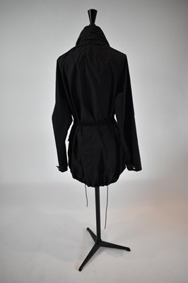 Lot 27 - LOUIS VUITTON; a black belted jacket, size 34.