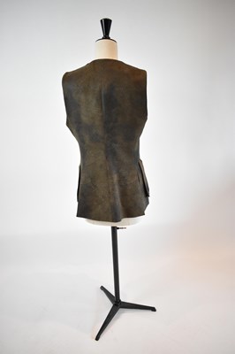 Lot 32 - T.BA; a khaki leather effect hunting waistcoat,...