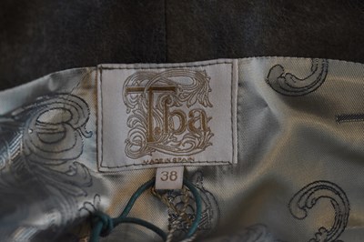 Lot 32 - T.BA; a khaki leather effect hunting waistcoat,...