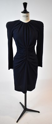 Lot 36 - GIVENCHY; a navy blue long sleeve dress, size 36.