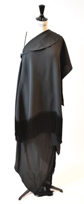 Lot 65 - BALENCIAGA; a black wool A-symmetrical dress...