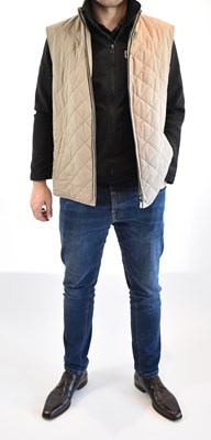 Lot 102 - LORO PIANA; a natural beige padded gilet, size...