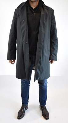 Lot 121 - LORO PIANA; a dark grey coat with padded...