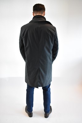 Lot 121 - LORO PIANA; a dark grey coat with padded...