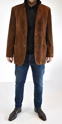 Lot 142 - ERMENEGILDO ZEGNA; a brown suede leather...