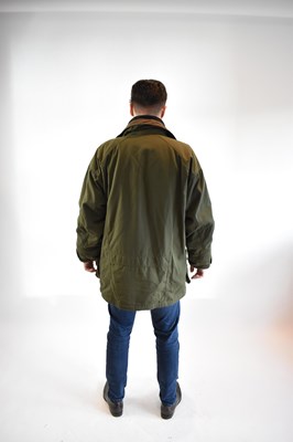 Lot 144 - SCHOFFEL; a khaki green Gortex field coat,...