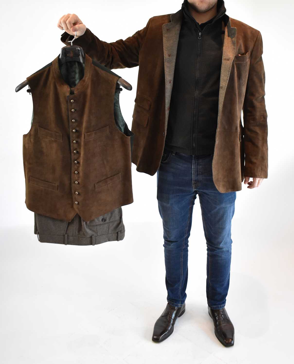 Lot 147 - HABSBURG: a a brown suede leather jacket, size...