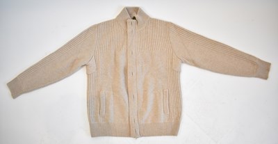 Lot 181 - LORO PIANA; a beige 100% cashmere button and...