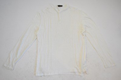 Lot 201 - LORO PIANA; a cream button neck long T-shirt,...