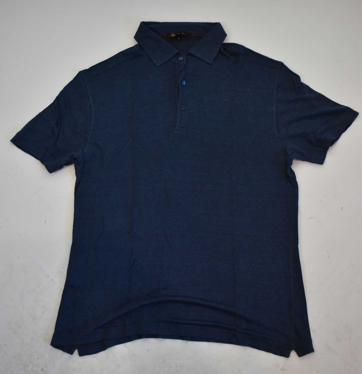 Lot 204 - LORO PIANA; a navy blue short sleeve polo