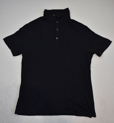 Lot 205 - LORO PIANA; a navy blue short sleeve polo...