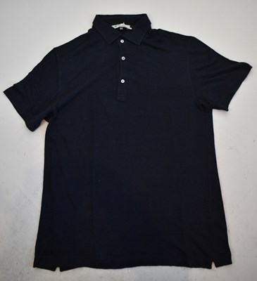 Lot 206 - LORO PIANA; a navy blue short sleeve polo...