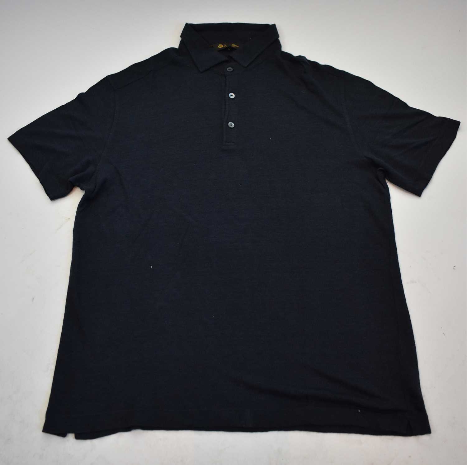 Lot 208 - LORO PIANA; a navy blue short sleeve polo