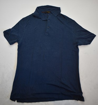 Lot 209 - LORO PIANA; a navy blue short sleeve polo...