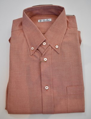 Lot 228 - LORO PIANA; a orange cotton long sleeve shirt,...