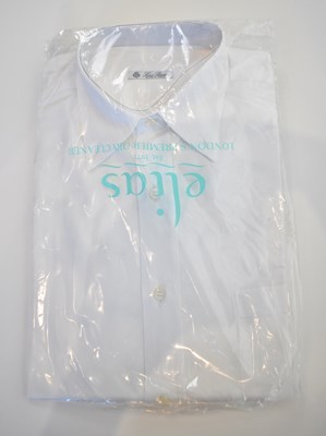 Lot 231 - LORO PIANA; a white cotton long sleeve shirt,...