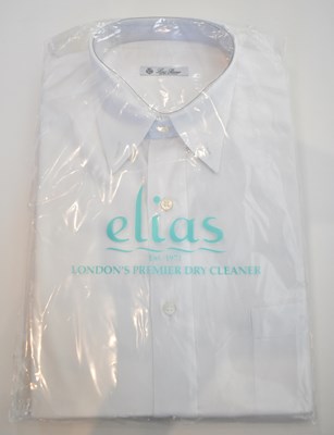 Lot 232 - LORO PIANA; a white cotton long sleeve shirt,...